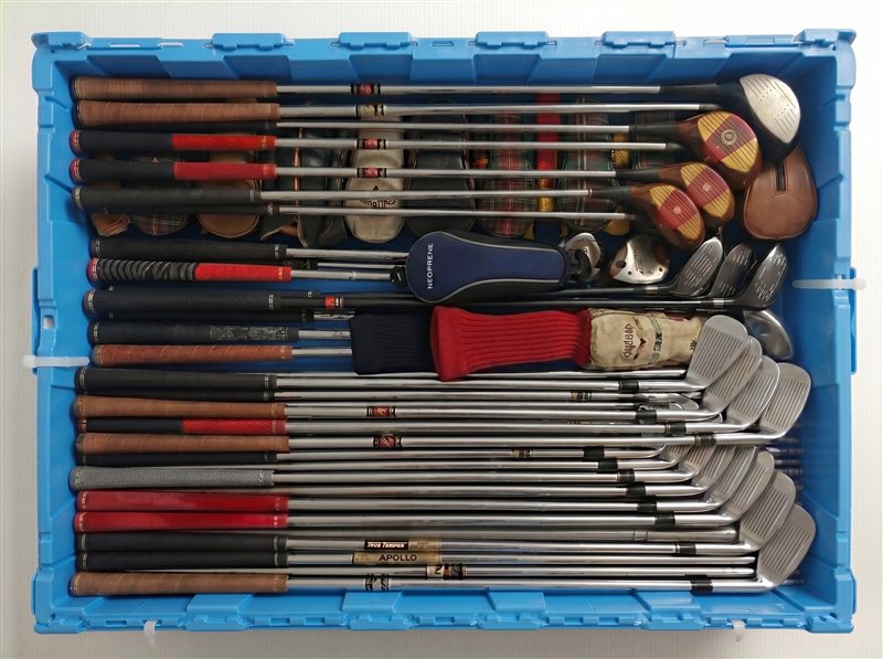 Golf clubs stored in a large Fort Lox box
